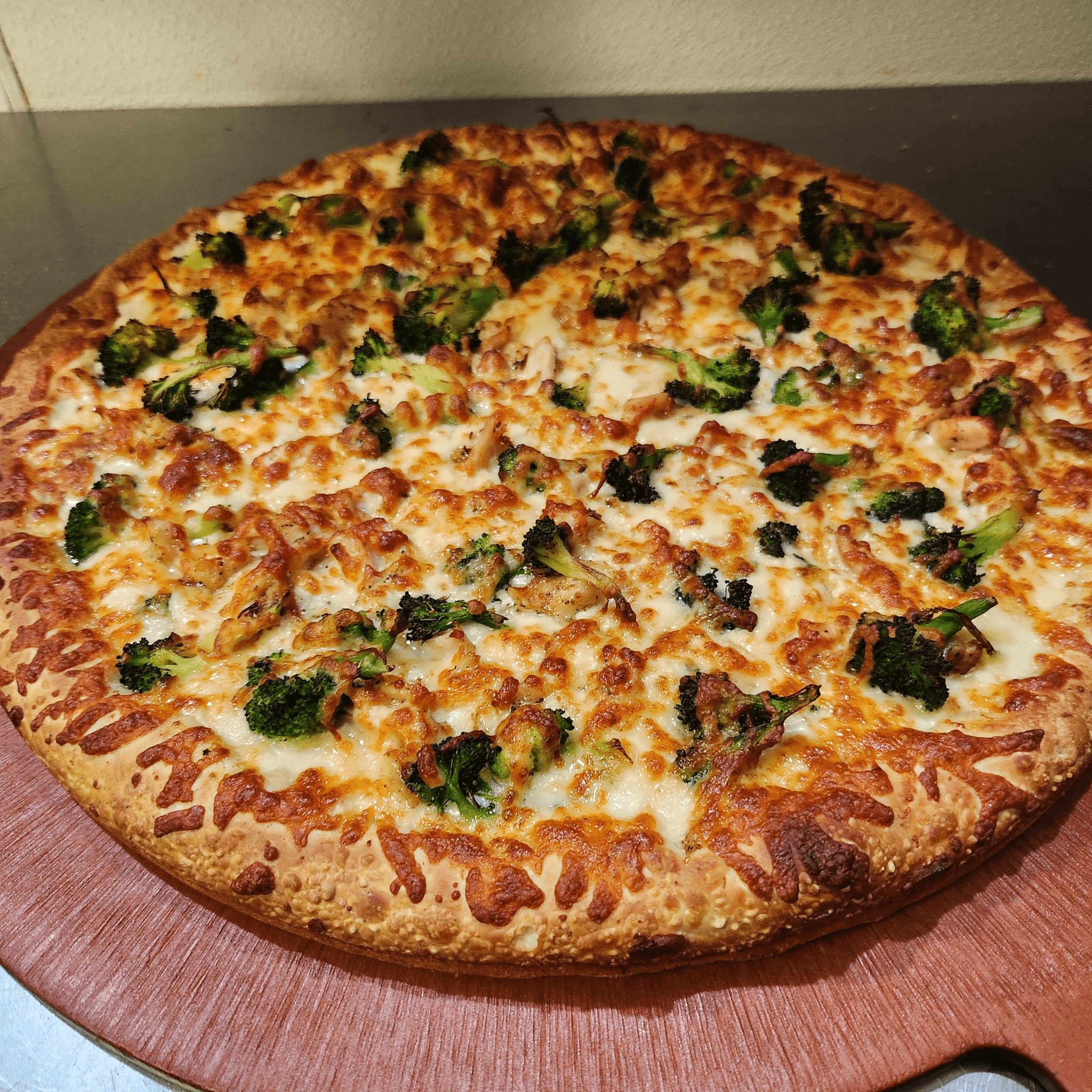 Chicken Broccli Alfrefo Pizza.